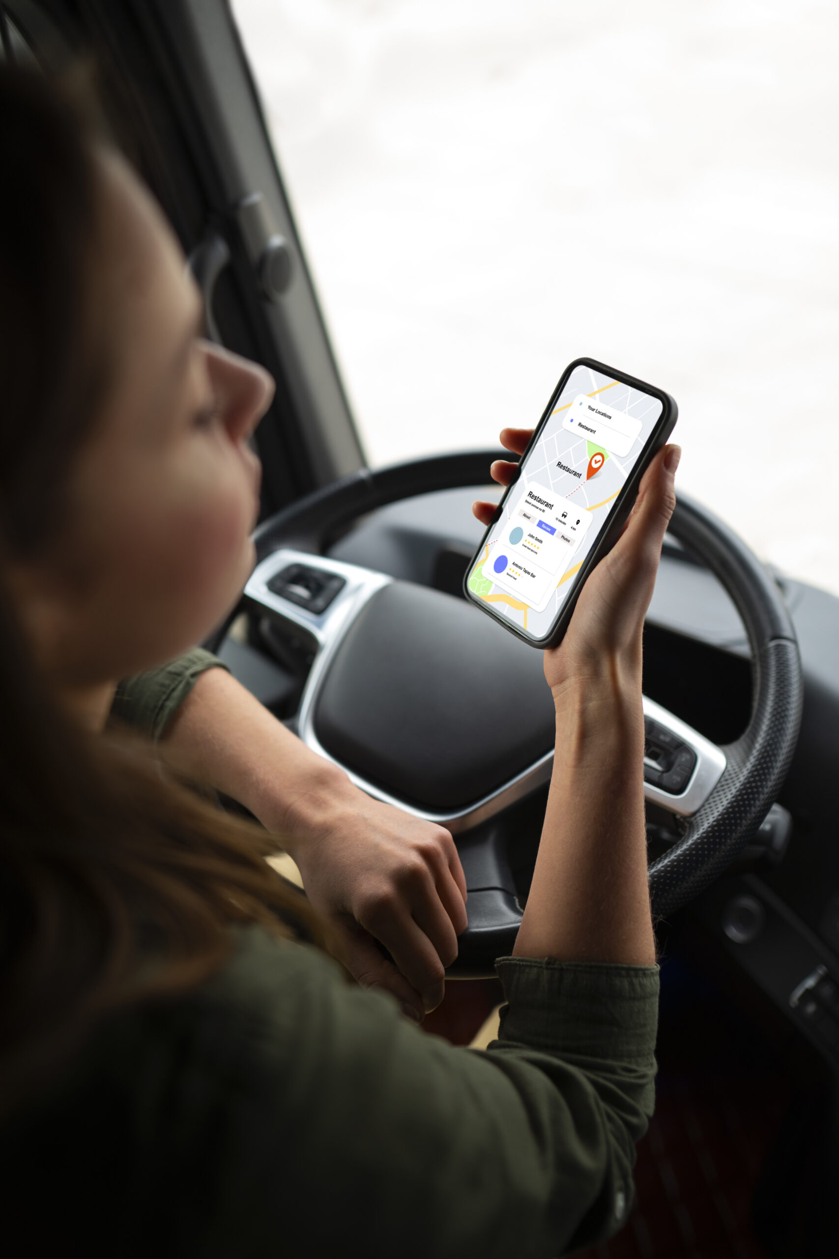 Auratraq mobile app showing live vehicle tracking map